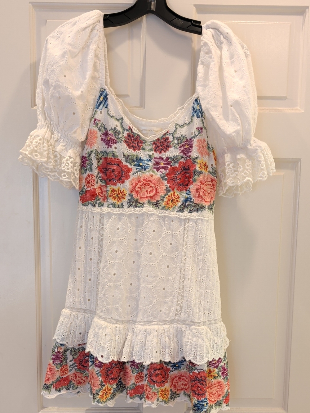Kids embroidered top likely a blouse or tee